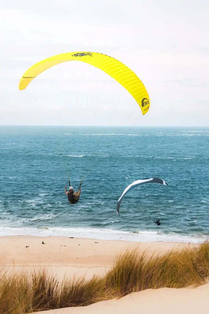 Parapentistes à la Dune du Pilat, reportage photo sport par Tristan Conil.