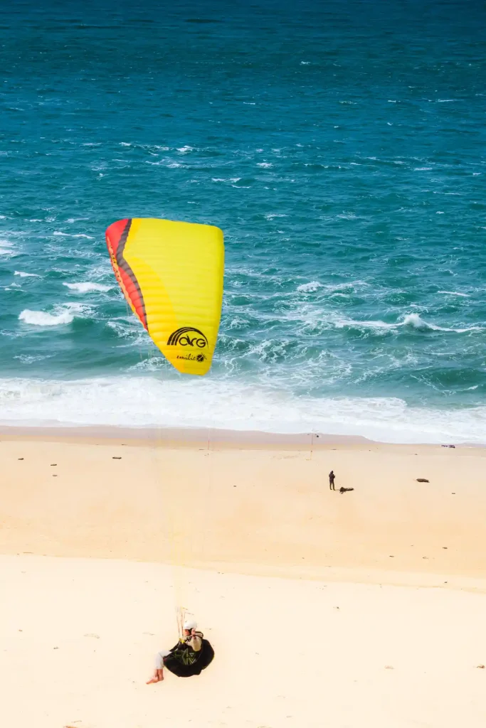 Parapentiste à la Dune du Pilat, reportage photo sport par Tristan Conil.